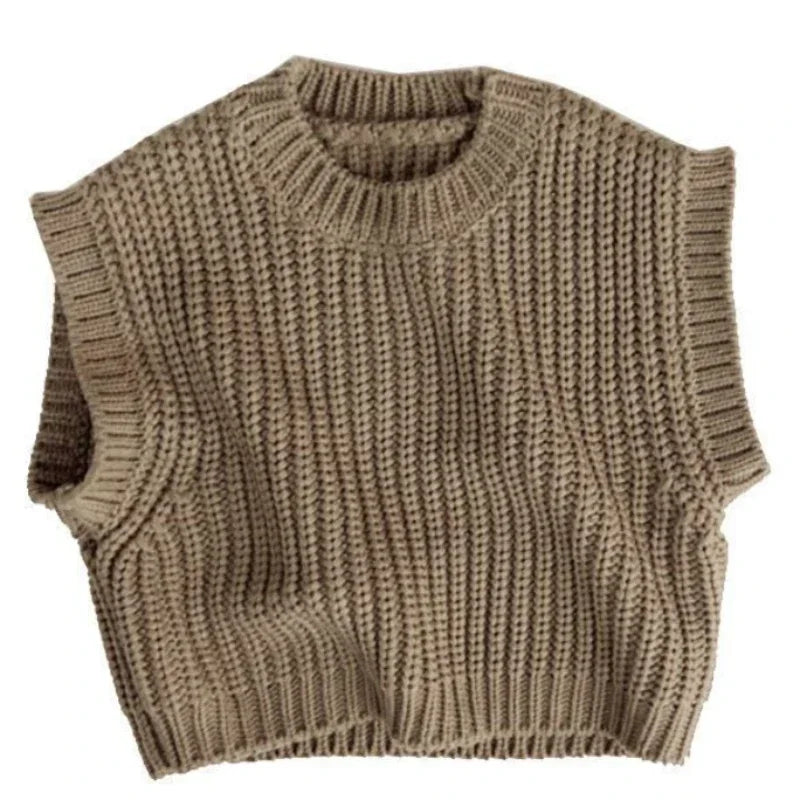 A BabyLove cozy knit sweater vest for babies in soft, neutral colors. The vest features a classic design with ribbed edges and a round neck perfect for layering in cooler weather by Bubebaby.