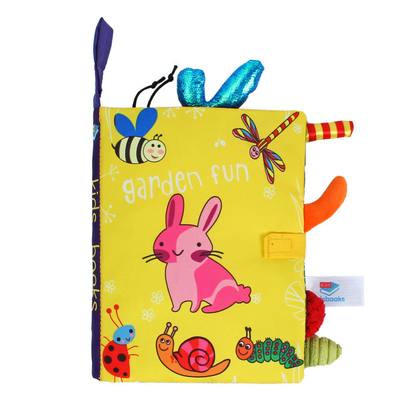 Crinkle cloth book with tails, garden theme