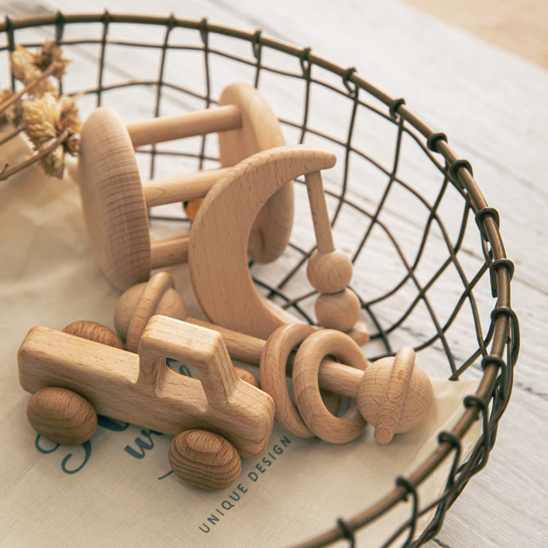 Pickup and moon wooden rattle set in a wire basket
