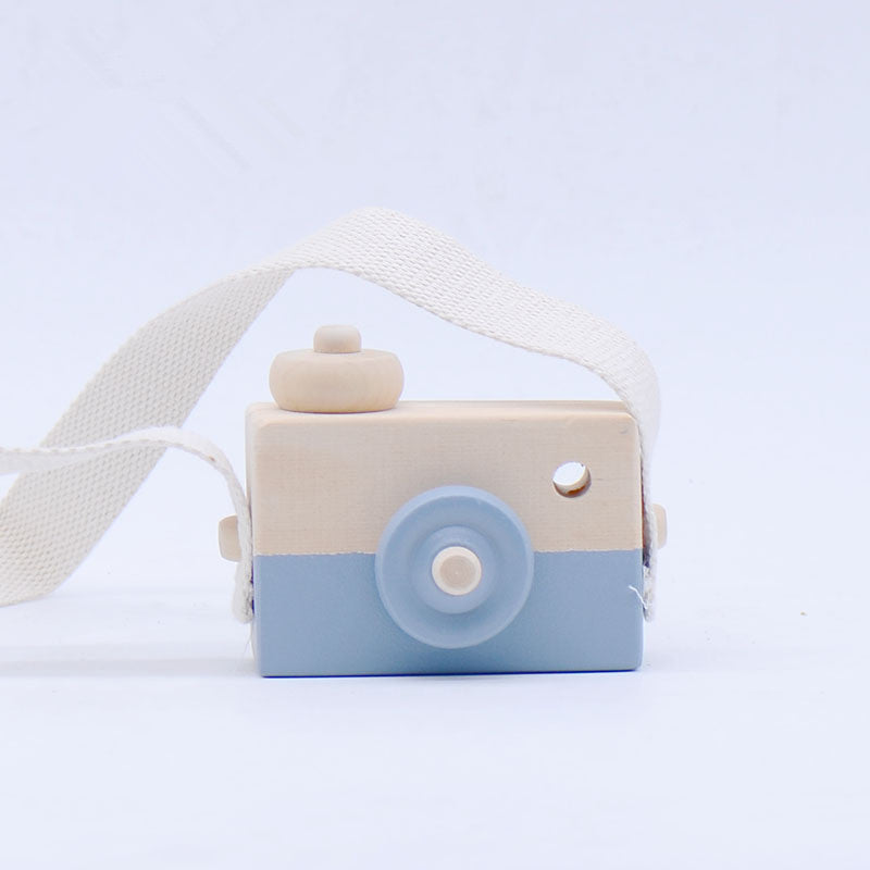 Gray wooden toy camera with cotton strap