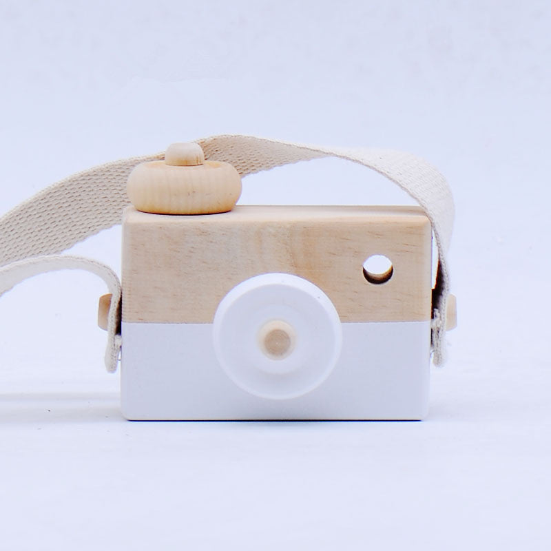White wooden toy camera with cotton strap