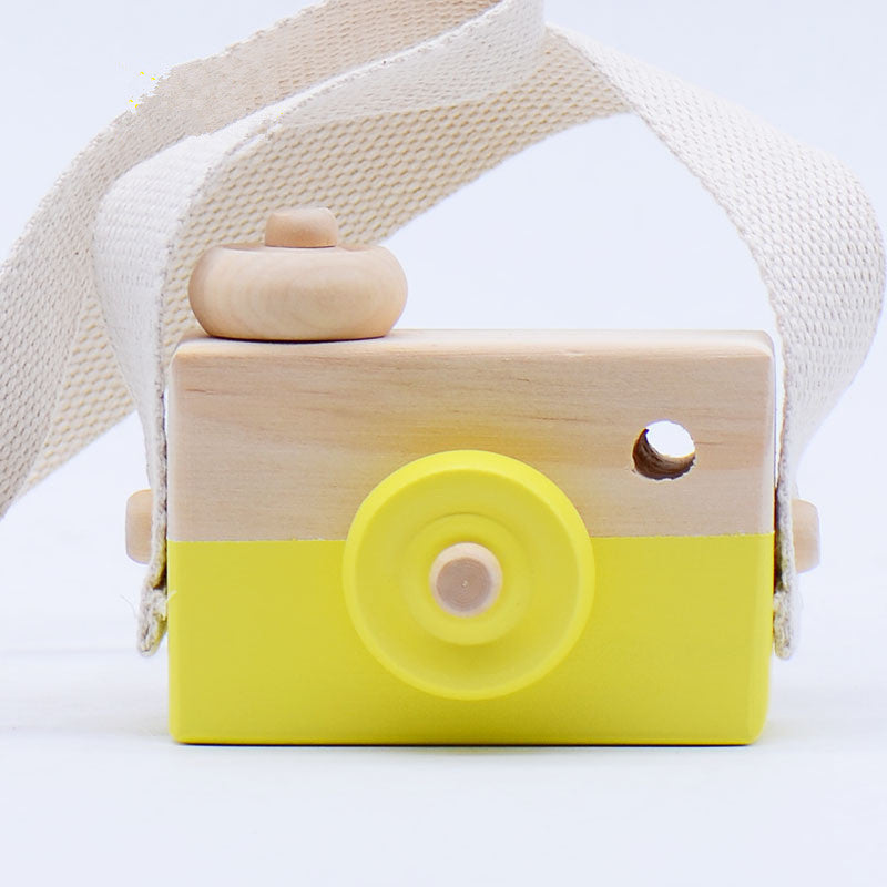 Yellow wooden toy camera with cotton strap