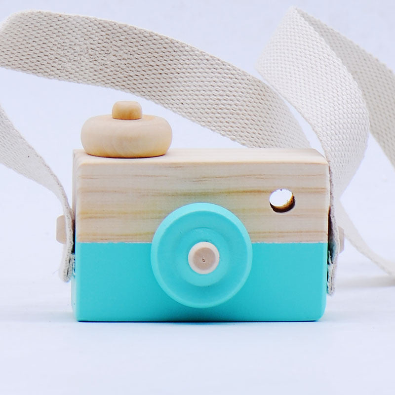 Mint green wooden toy camera with cotton strap