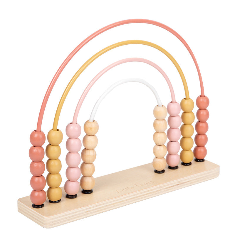 Pink wooden rainbow counting abacus on white background