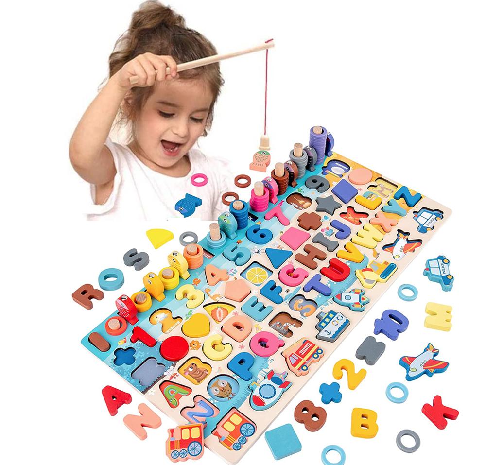 Child fishing for pieces on the wooden learning board