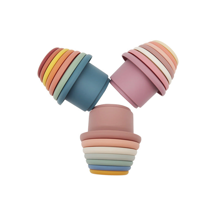 Three sets of silicone stacking cups nested