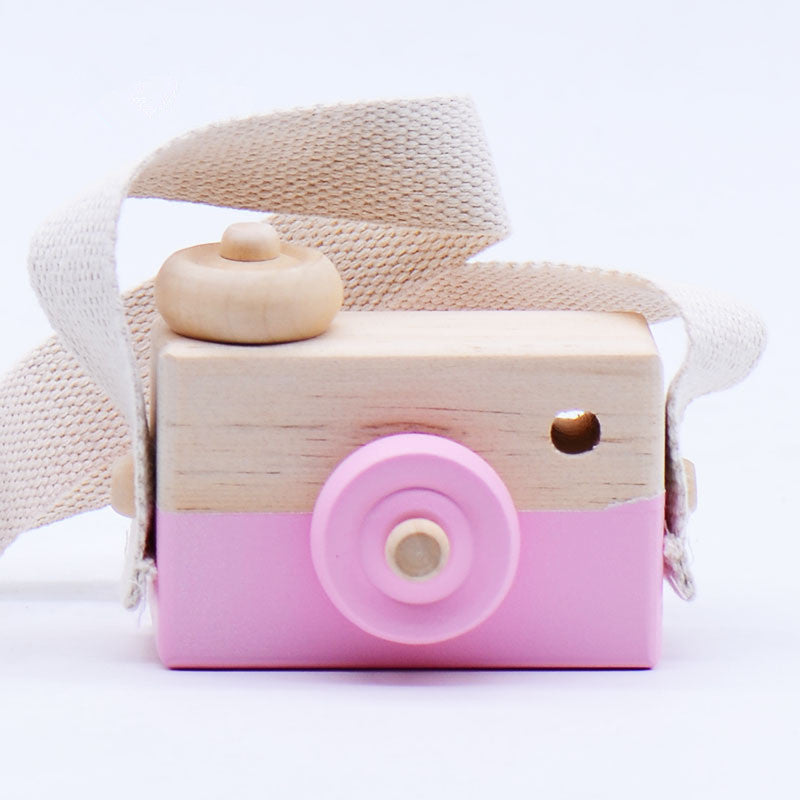 Pink wooden toy camera with cotton strap