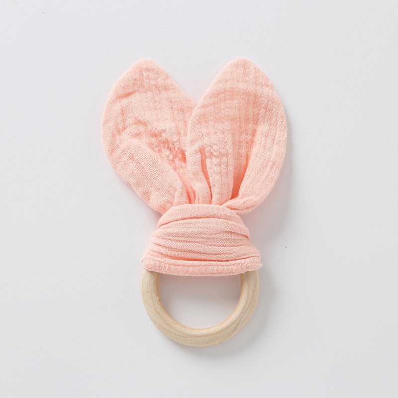 Light pink muslin bunny ear teether ring