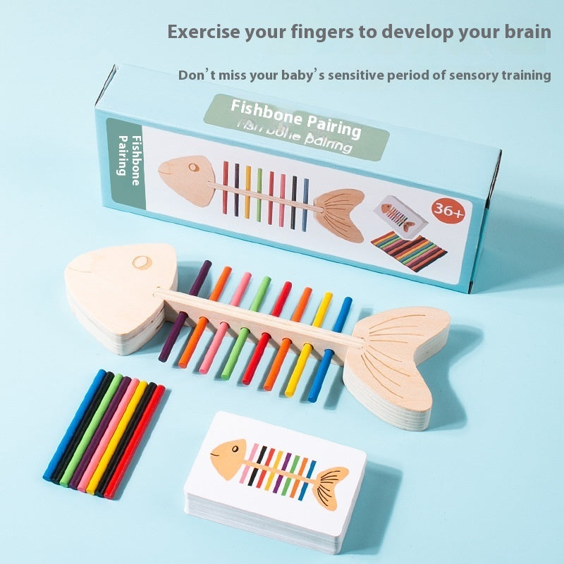 Wooden fishbone color sorting game with box, sticks and cards