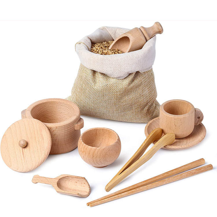 Wooden sensory bin tool set on white background