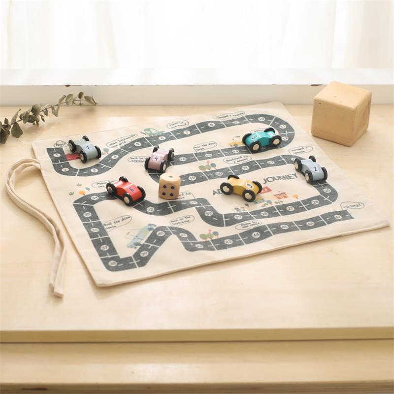 Canvas race track mat with wooden cars and die