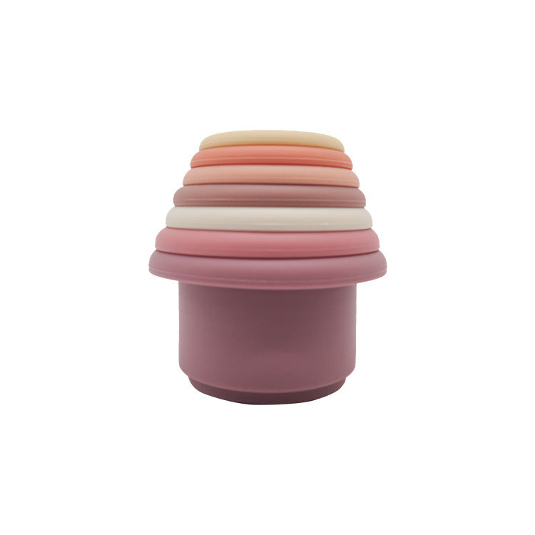 Purple silicone stacking cups nested together
