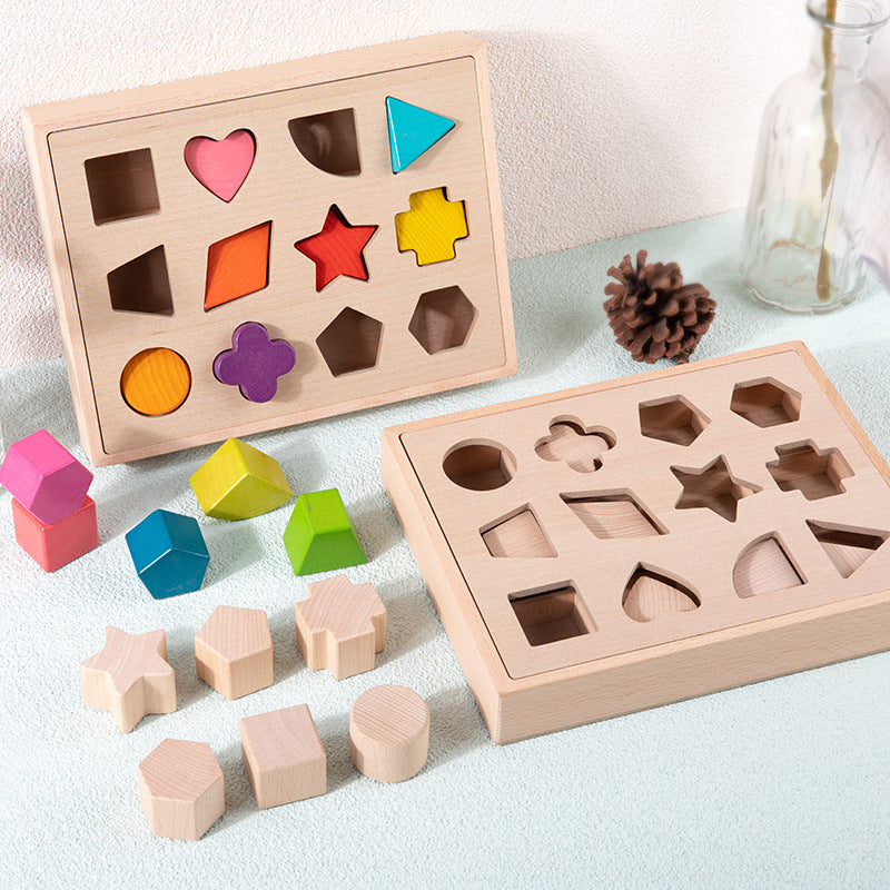 Colored and natural wooden shape sorting boxes with blocks