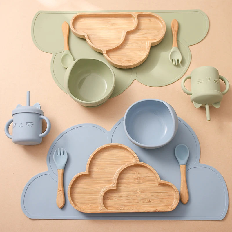 Eco-friendly Bubebaby Babylove 6-piece/7-piece Bamboo and Silicone Dinnerware Set for babies aged 6 months to 6 years. Made from BPA-free silicone and bamboo wood, this set includes a bowl, plate, fork, spoon, and teething toys, providing a safe and healthy mealtime experience. Certified by CE, EU, CIQ, and other standards for safety and quality