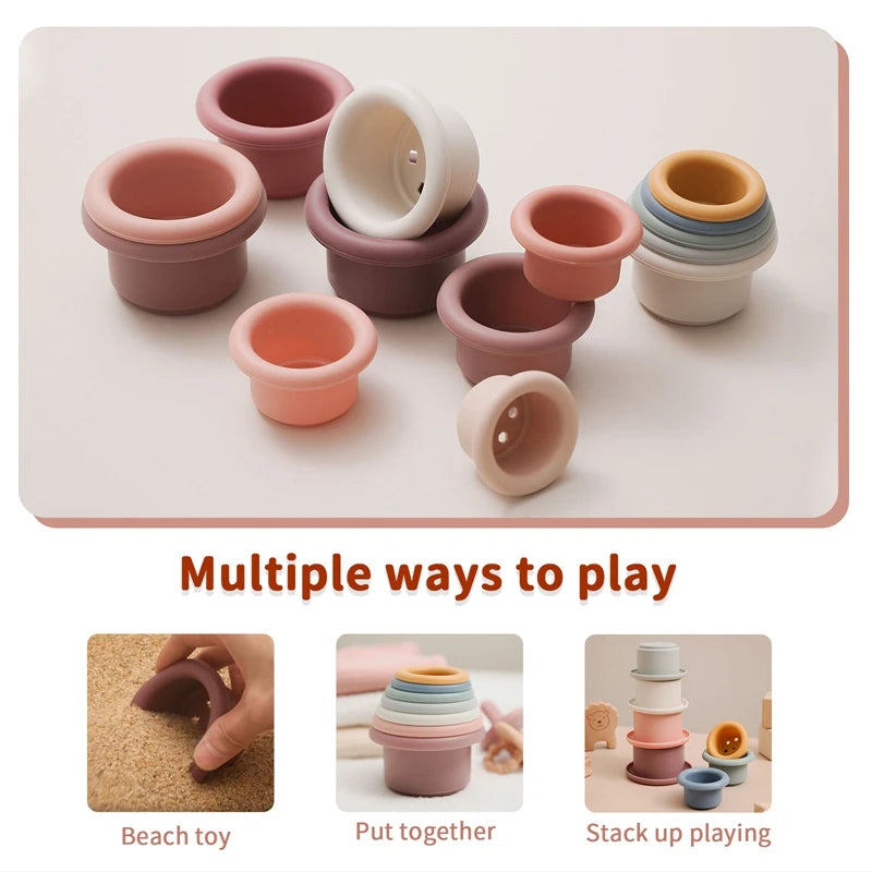 Discover the Montessori Silicone Stacking Cups at BubeBaby. Made from durable ABS, these versatile cups are perfect for beach, bath, and indoor play. Packaged in a net bag, they offer endless fun . Ideal for sensory play and skill development