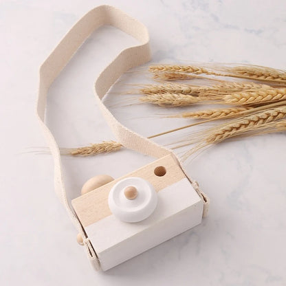 Babylove Wooden Vintage Camera in 8 colors, ideal for baby room decoration and play, designed with soft, textured surfaces for children aged 3-6 years. Unisex, CE certified, and Montessori-inspired