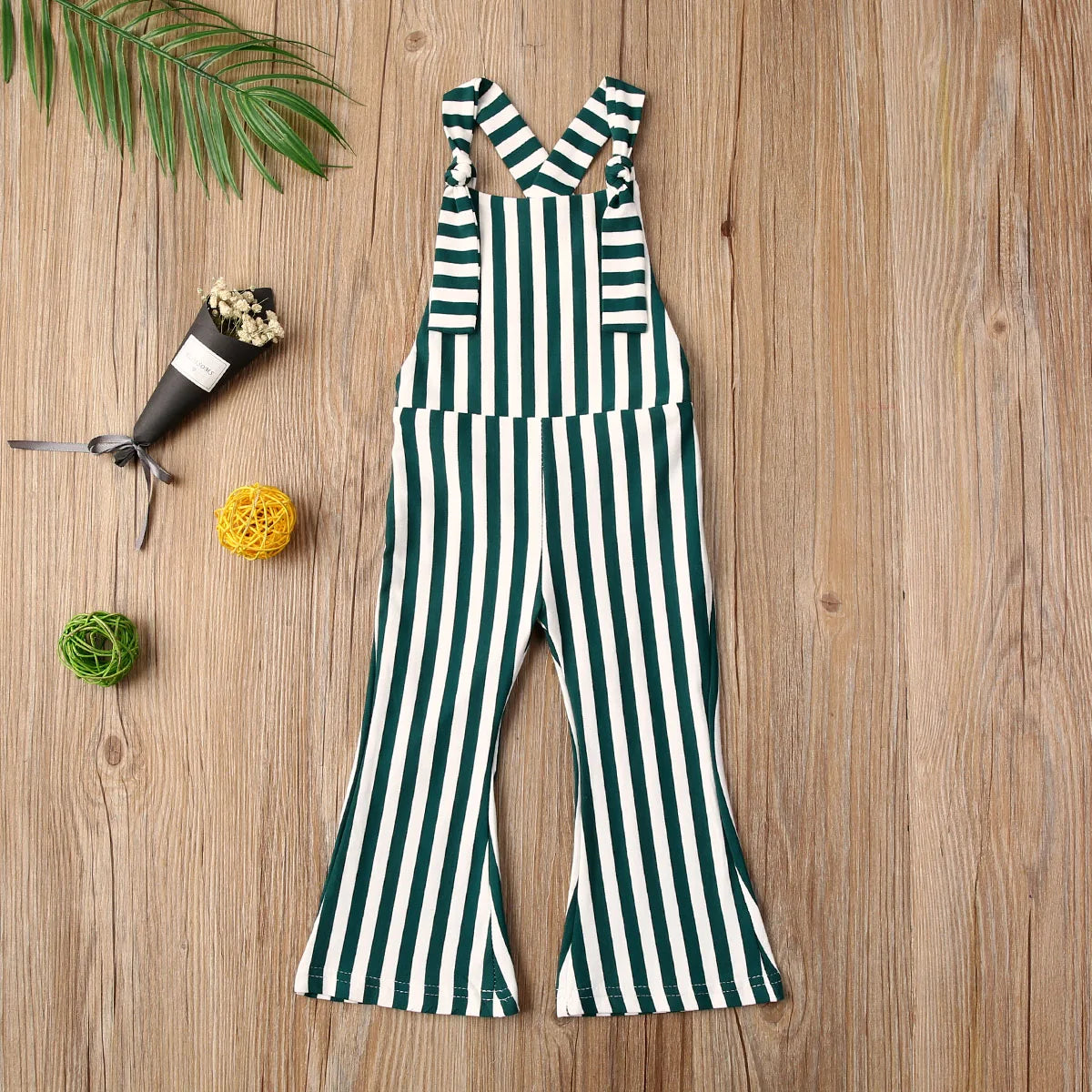 BabyLove Sleeveless Striped Romper at BubeBaby, perfect for baby girls from 0-5 years. Made from a comfy cotton-polyester blend, this versatile romper features a square collar, covered button closure, and short sleeves, ideal for all seasons. 