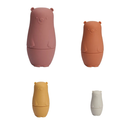 Montessori Silicone Bear Matryoshka Toy: A set of soft, stackable, bear-shaped nesting dolls in various sizes, made from pastel-colored, food-grade silicone. The bears fit inside one another, designed to encourage fine motor skills, sensory exploration, and cognitive development in young children