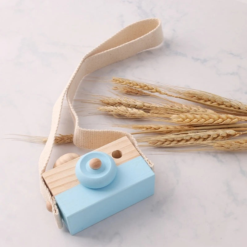 Babylove Wooden Vintage Camera in 8 colors, ideal for baby room decoration and play, designed with soft, textured surfaces for children aged 3-6 years. Unisex, CE certified, and Montessori-inspired