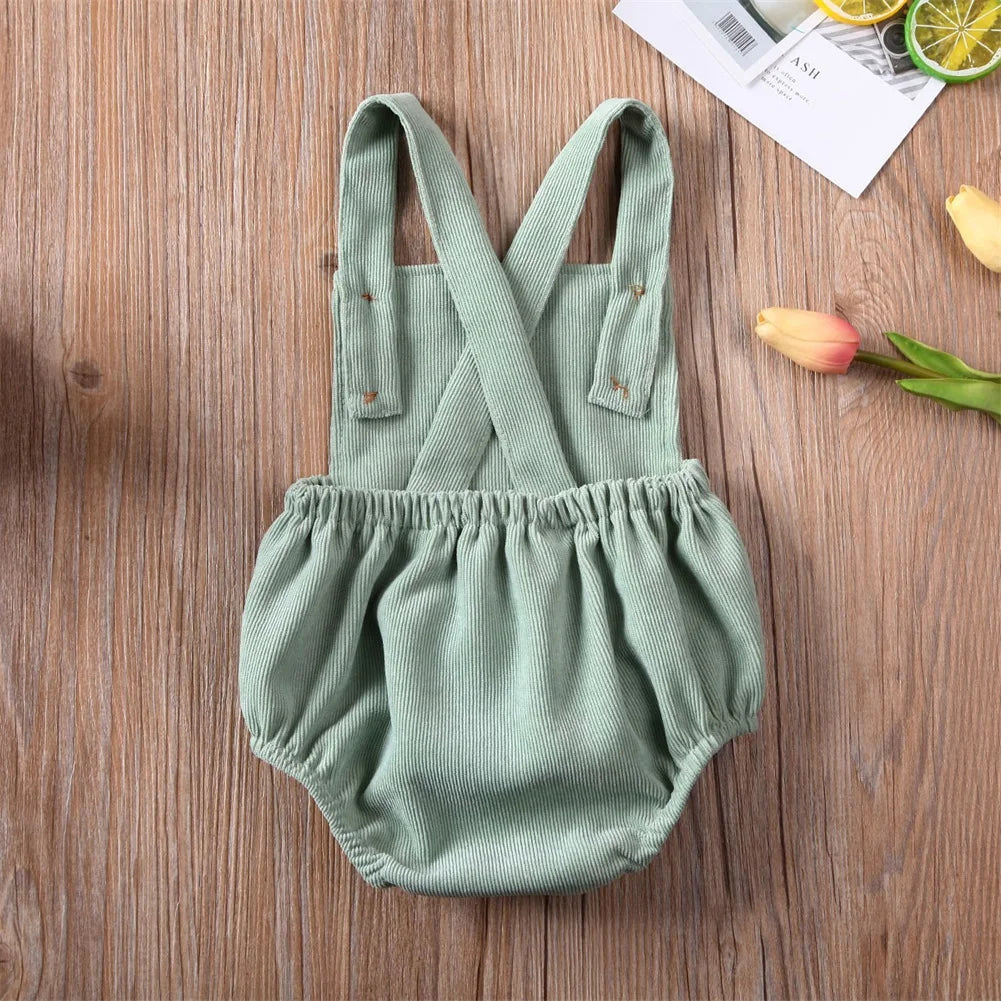 BabyLove Corduroy Unisex Romper - Soft, brown corduroy fabric with long sleeves, button-down front, and a cozy fit. Perfect for infants and toddlers. Gender-neutral design