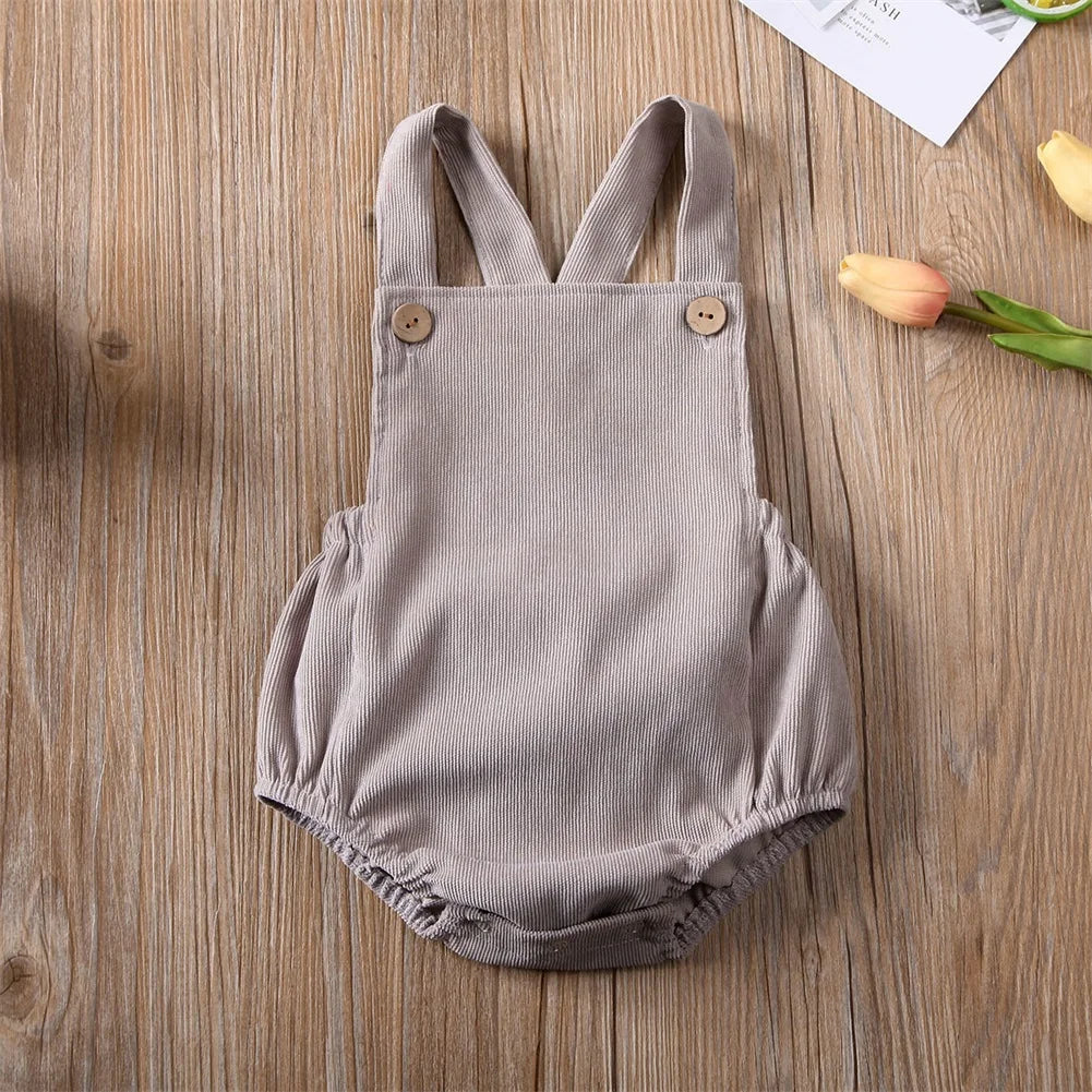 BabyLove Corduroy Unisex Romper - Soft, brown corduroy fabric with long sleeves, button-down front, and a cozy fit. Perfect for infants and toddlers. Gender-neutral design