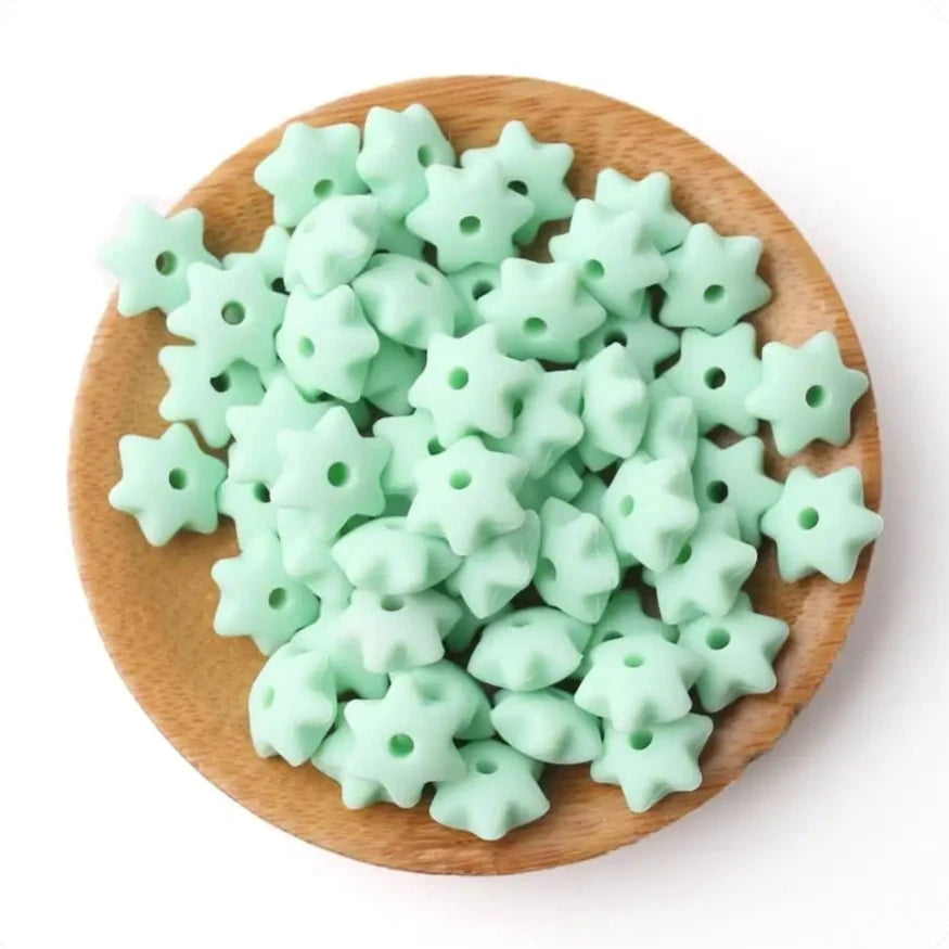 Explore our star-shaped silicone teether beads, packed in sets of 40. Made from BPA-free silicone, these teething beads are safe and durable. Note: Loose beads are a choking hazard; ensure they are threaded on anti-break nylon thread for safety