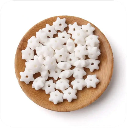Explore our star-shaped silicone teether beads, packed in sets of 40. Made from BPA-free silicone, these teething beads are safe and durable. Note: Loose beads are a choking hazard; ensure they are threaded on anti-break nylon thread for safety