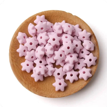 Explore our star-shaped silicone teether beads, packed in sets of 40. Made from BPA-free silicone, these teething beads are safe and durable. Note: Loose beads are a choking hazard; ensure they are threaded on anti-break nylon thread for safety