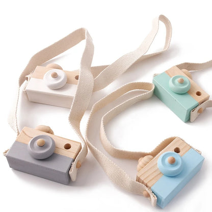 Babylove Wooden Vintage Camera in 8 colors, ideal for baby room decoration and play, designed with soft, textured surfaces for children aged 3-6 years. Unisex, CE certified, and Montessori-inspired