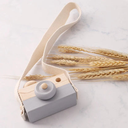 Babylove Wooden Vintage Camera in 8 colors, ideal for baby room decoration and play, designed with soft, textured surfaces for children aged 3-6 years. Unisex, CE certified, and Montessori-inspired