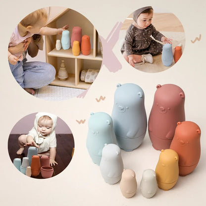 Montessori Silicone Bear Matryoshka Toy: A set of soft, stackable, bear-shaped nesting dolls in various sizes, made from pastel-colored, food-grade silicone. The bears fit inside one another, designed to encourage fine motor skills, sensory exploration, and cognitive development in young children