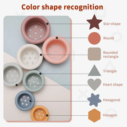 Discover the Montessori Silicone Stacking Cups at BubeBaby. Made from durable ABS, these versatile cups are perfect for beach, bath, and indoor play. Packaged in a net bag, they offer endless fun . Ideal for sensory play and skill development