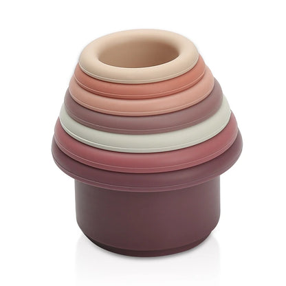 Discover the Montessori Silicone Stacking Cups at BubeBaby. Made from durable ABS, these versatile cups are perfect for beach, bath, and indoor play. Packaged in a net bag, they offer endless fun . Ideal for sensory play and skill development