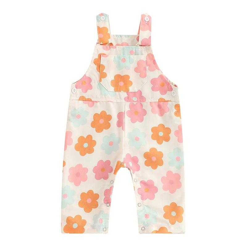 Bubebaby BabyLove Floral Jumpsuit Dungaree Romper. The romper features a floral pattern with a mix of vibrant colors. Featuring a pocket on the chest with shoulder straps, and snap closures at the bottom for easy diaper changes.