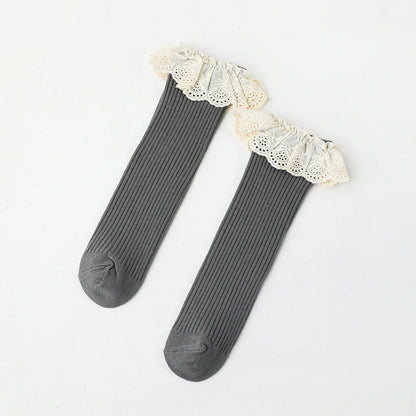 Bubebaby Babylove socks, perfect for all occasions. Made from cotton and polyester, these breathable comfortable, and skin-friendly socks are made with a solid pastoral style  featuring a ruffled frill finish