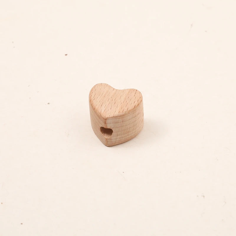 Beech wood heart shape with a threading hole