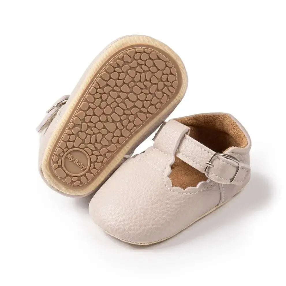Bubebaby BabyLove faux leather dress shoes in a classic look. The shoes feature a sleek, polished design perfect for special occasions or formal wear. With a soft, cushioned interior for comfort