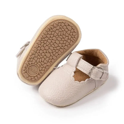 Bubebaby BabyLove faux leather dress shoes in a classic look. The shoes feature a sleek, polished design perfect for special occasions or formal wear. With a soft, cushioned interior for comfort