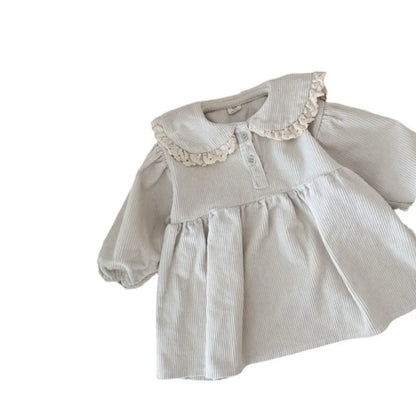 BabyLove Corduroy Peter Pan Collar Dress - A charming baby dress made from soft corduroy fabric, featuring a classic Peter Pan collar and delicate detailing, perfect for special occasions or everyday wear