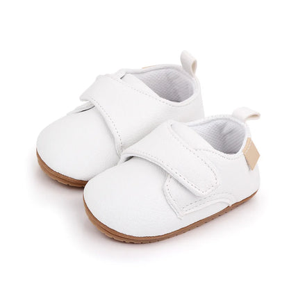 Bubebaby BabyLove faux leather dress shoes in a classic look. The shoes feature a sleek, polished design perfect for special occasions or formal wear. With a soft, cushioned interior for comfort