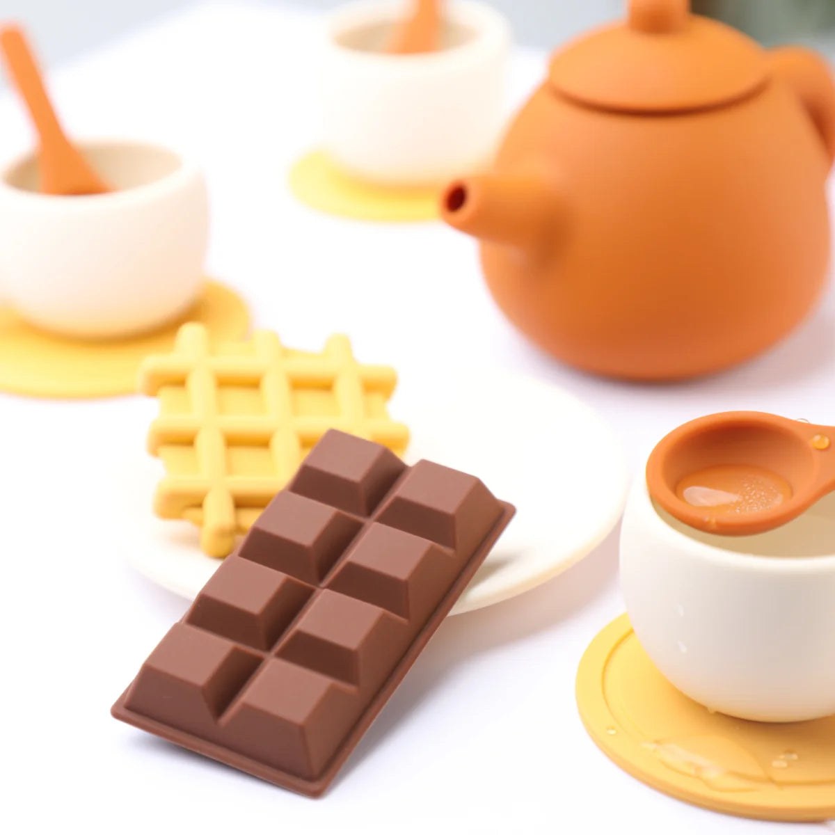 Close-up of the silicone chocolate bar, waffle and teacup
