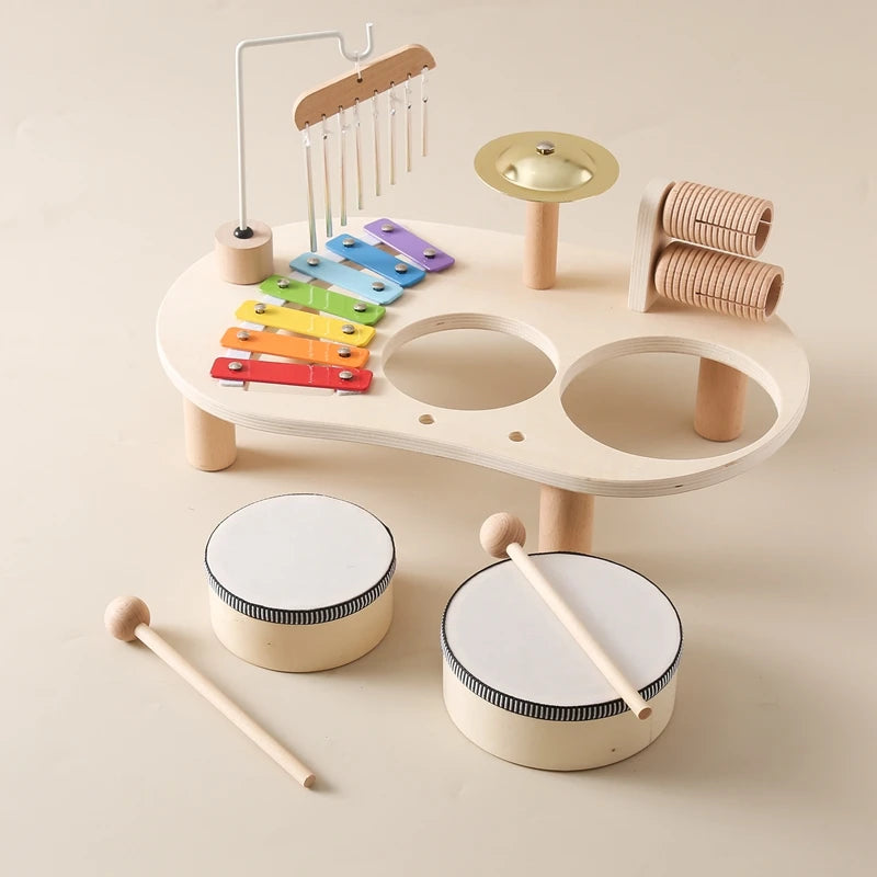 Discover the Bubebaby Montessori Music Table, an educational and non-electric musical instrument designed for children ages 0-14+. This table features engaging musical elements. Lightweight at 1.23kg and measuring 41.2X24.7X9.5cm, it's perfect for young learners seeking fun and educational play