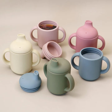 Silicone sippy cups with handles in five colours, lids on and off