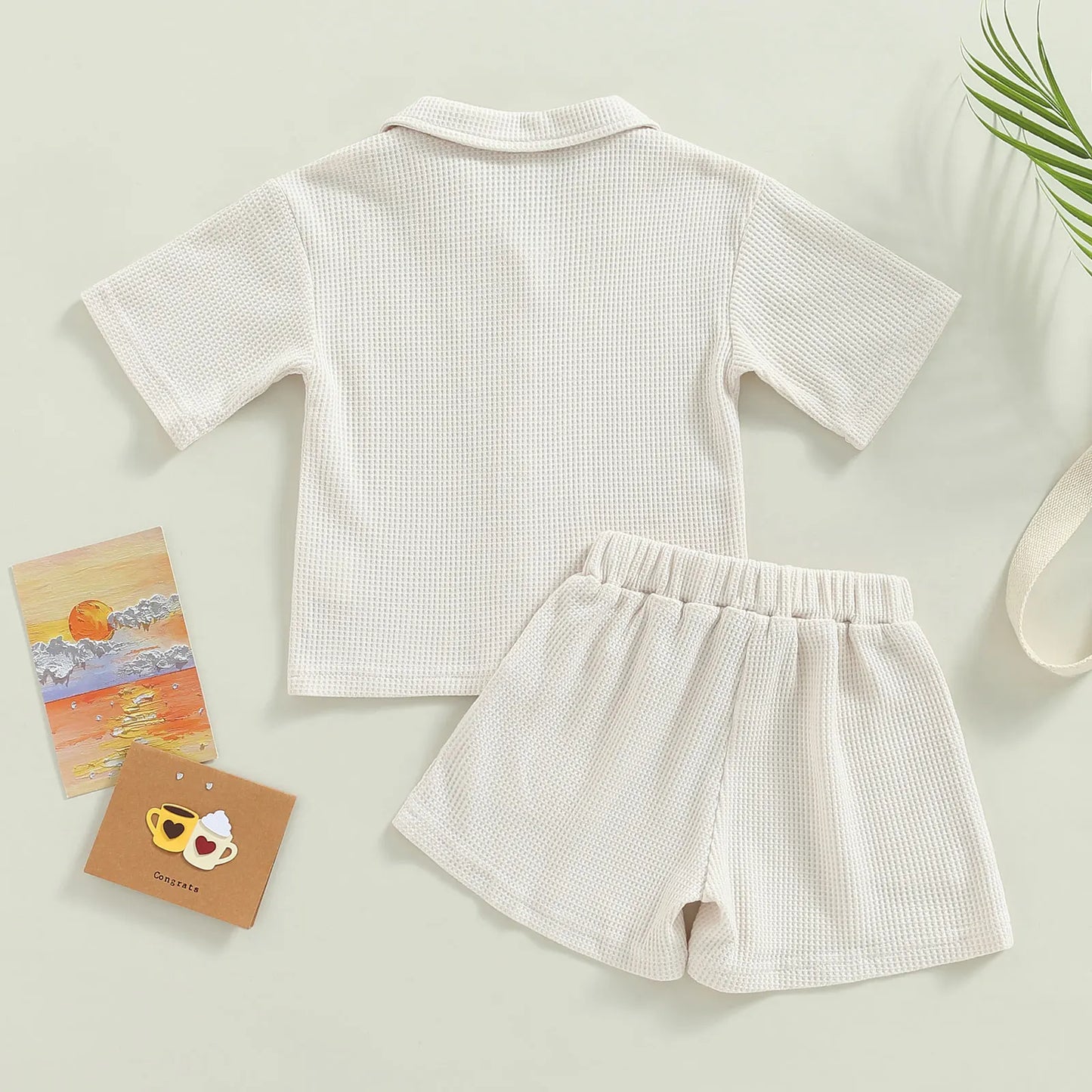 Shop our Bubebaby BabyLove summer baby unisex sets made from cotton and polyester, featuring a V-neck, single-breasted closure, and short sleeves. Available for ages 0-4 years with sizes ranging from 80-120 cm. The set includes a top and shorts with a cute print pattern, fitting true to size. Ideal for warm weather, these sets ensure comfort and style for your little ones.