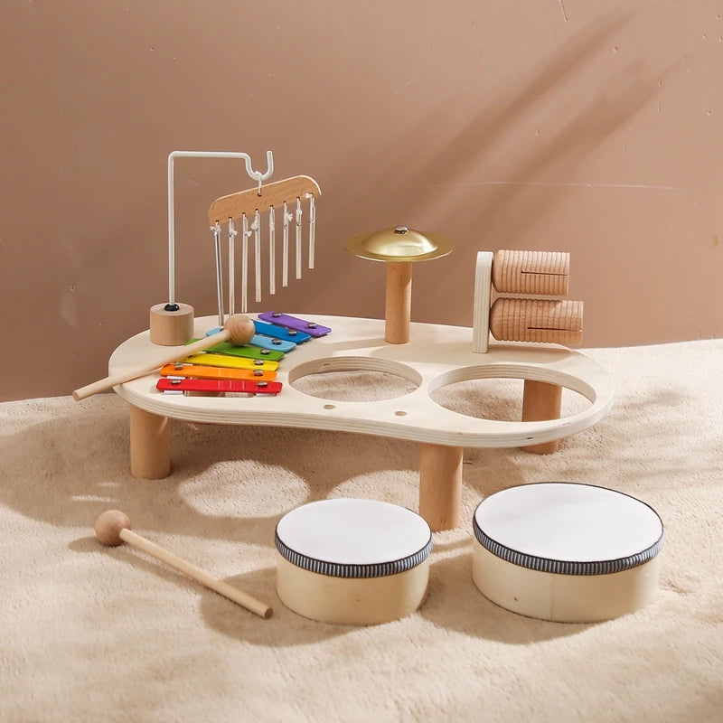 Discover the Bubebaby Montessori Music Table, an educational and non-electric musical instrument designed for children ages 0-14+. This table features engaging musical elements. Lightweight at 1.23kg and measuring 41.2X24.7X9.5cm, it's perfect for young learners seeking fun and educational play