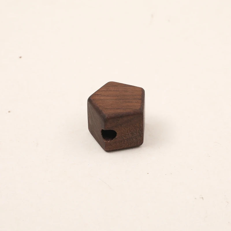 Walnut pentagon shape with a threading hole