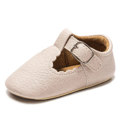Bubebaby BabyLove faux leather dress shoes in a classic look. The shoes feature a sleek, polished design perfect for special occasions or formal wear. With a soft, cushioned interior for comfort