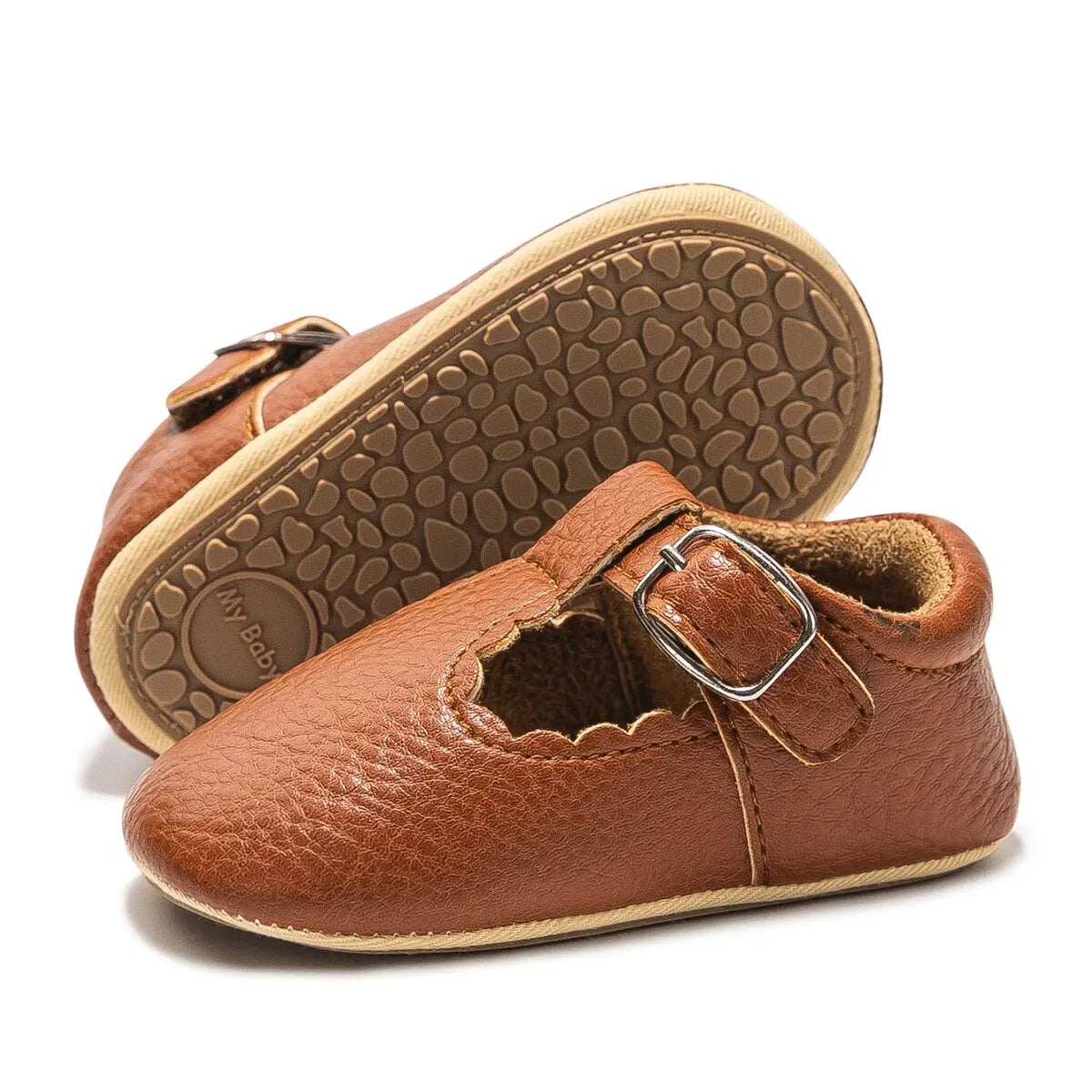 Bubebaby BabyLove faux leather dress shoes in a classic look. The shoes feature a sleek, polished design perfect for special occasions or formal wear. With a soft, cushioned interior for comfort
