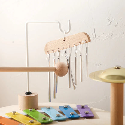 Discover the Bubebaby Montessori Music Table, an educational and non-electric musical instrument designed for children ages 0-14+. This table features engaging musical elements. Lightweight at 1.23kg and measuring 41.2X24.7X9.5cm, it's perfect for young learners seeking fun and educational play