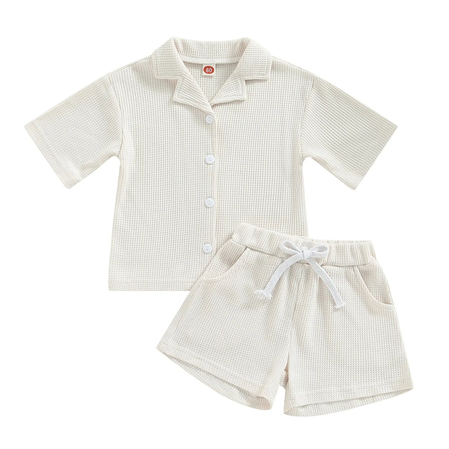 Shop our Bubebaby BabyLove summer baby unisex sets made from cotton and polyester, featuring a V-neck, single-breasted closure, and short sleeves. Available for ages 0-4 years with sizes ranging from 80-120 cm. The set includes a top and shorts with a cute print pattern, fitting true to size. Ideal for warm weather, these sets ensure comfort and style for your little ones.